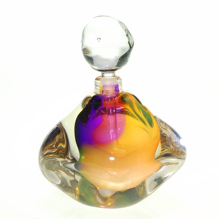 Leon Applebaum perfume, stopper, 5", signed, '83: Early Leon Applebaum “rock form” perfume with a purple and golden opal core and a clear “stone” stopper. Combined height 5 inches. Artist signed with the 1983 date. Unusual shape, wonderful co