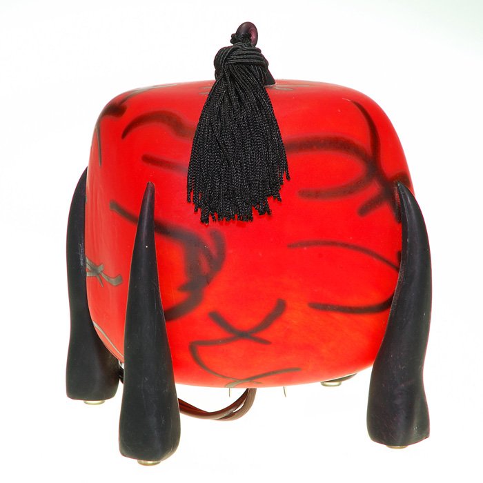 Diane Leppla Oriental evening lamp, 7”, signed: Delightful Chinese red evening lamp by Diane Leppla. Ebony glass tusks loft the square globe decorated with Oriental designs and topped with a silk tassel. Measures 7 inches by 6 1/2 inches wide. Date