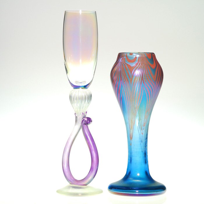 Rick Strini vase + Bri’-oni champagne flute, signed: Two items: 1) Early 8 inch Rick Strini vase created in 1979 with pull feather design. Signed & dated. 2) Bri’-oni 10 3/4 inch champagne flute with purple loop stem and having a “bubble-like” iri