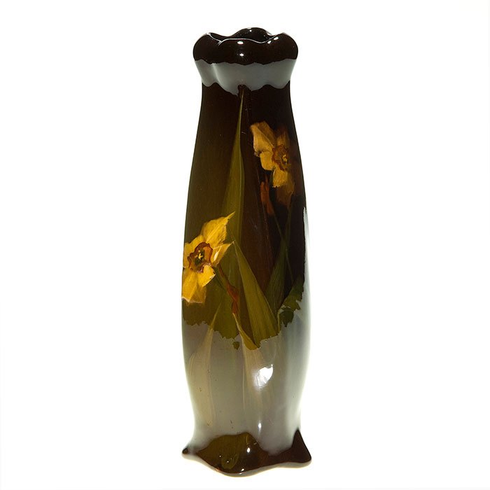 Roseville Rozane Royal, jonquils, V. Adams, 10”: Roseville Rozane Royale “twist” vase with a growth of jonquils hand decorated by Virginia Adams. Height 10 inches. Raised wafer logo beneath, the artist signature on the side. Nice shape, glaze an