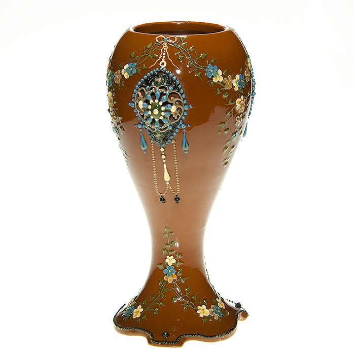 Weller Turada lamp base, applied flowers, 11 1/4”: Weller Turada lamp base with flowers and foliage attractively applied and flaunting “blow-out” pierced medallions adorned with a suspend of prisms and beadwork. Height 11 1/4 inches. Impressed “