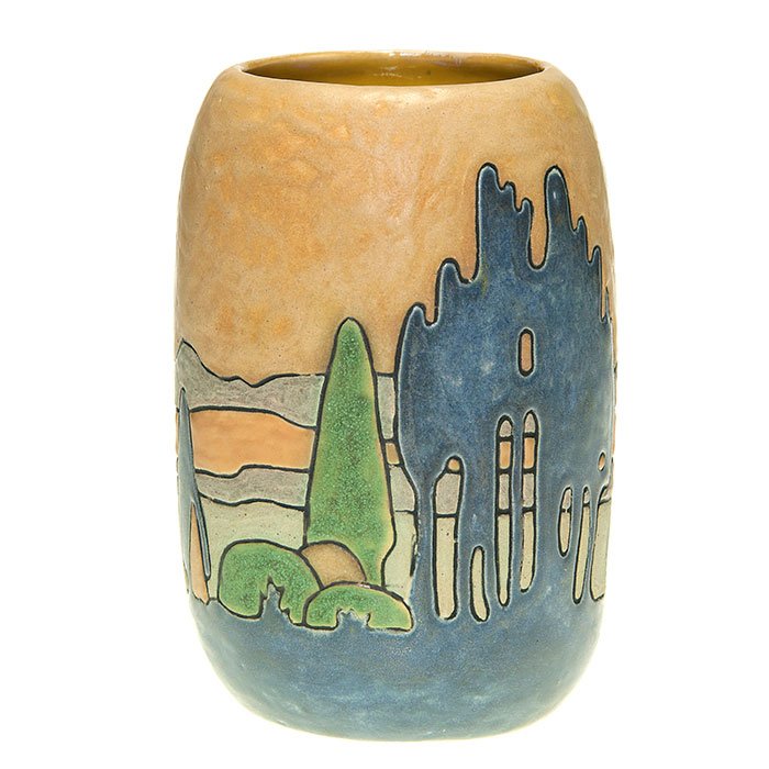 Arts & Clay Company scenic vase, 6 1/4”: Scenic 6 1/4 inch vase by The Arts & Clay Company showing trees and rolling hills done in green, blue, yellow, orange and gray mat glazes. Marked on the bottom with the company logo and having a styli