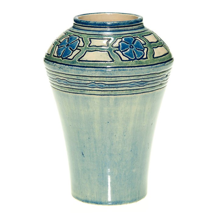 Newcomb high glaze vase, Le Blanc, 1905, 5 5/8”: Nice Newcomb College vase with incised and painted vinca decoration done in 1905 by Maria de Hoa Le Blanc. Marks include the Newcomb logo, the date code for 1905 (AL 6) in blue slip, JM for potter Jos