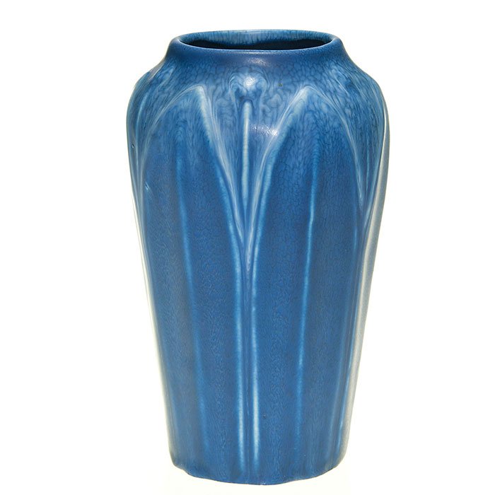Hampshire blue mat vase, leaves, shape 33, 6 5/8”: Hampshire Pottery 6 5/8 inch vase covered with a good mat blue glaze with mottling at the shoulder. Marked Hampshire Pottery, the “Emoretta” mark and shape number 33. No crazing.