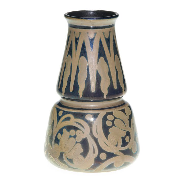 Rare Burmantofts luster ware decorated vase, 6 5/8”: Rare Burmantofts decorated lustre ware vase with repeating floral patterns. Impressed “The Leeds Fireclay Company Ltd.” logo on bottom along with A in black slip and incised D. Height 6 5/8” Res