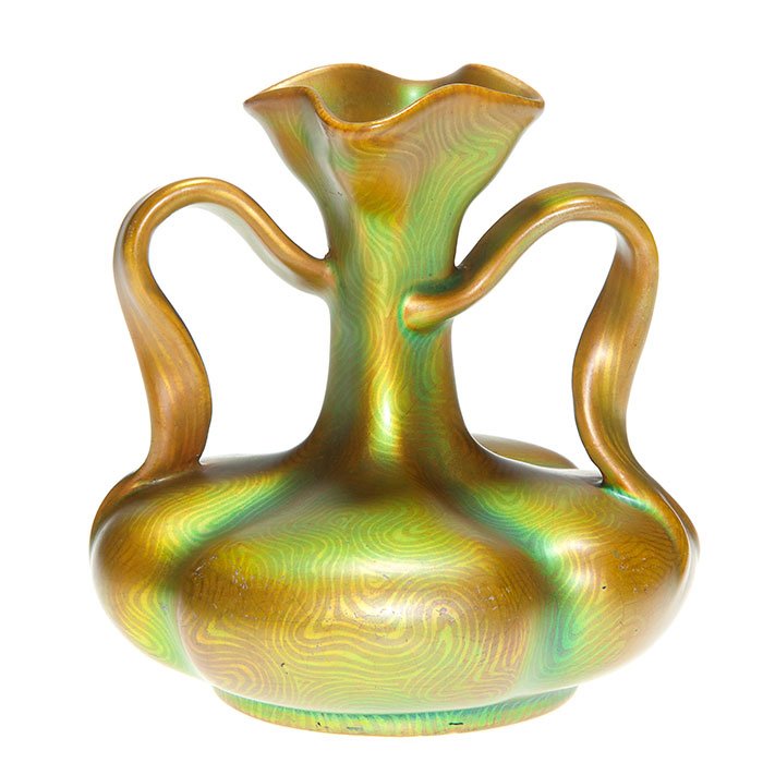 Zsolnay “Tiffany Style” 2 handled vase: Zsolnay “Tiffany” style two handled vase with intricate line patterns. Impressed “Zsolnay Pecs 5325 246 19” and marked with the Zsolnay logo in a dotted circle. Height 4 3/8 inches. Excellent 