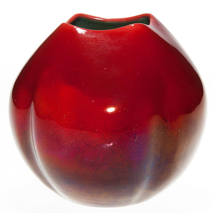 Zsolnay red luster ware vase, ca 1900, 5 1/4”: Zsolnay red luster vase with very modern design done, circa 1900. Marked with the raised Zsolnay wafer seal and the numbers 6030 and the letter M. Height 5 1/4 inches. Minor surface abrasions.