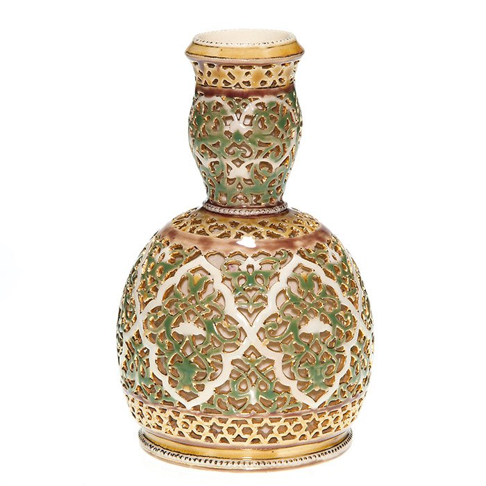 Zsolnay Pécs reticulated gourd vase, 7 1/4”, marks: Zsolnay reticulated double gourd vase in green and tan with gold accenting. Height 7 1/4 inches. Impressed “Zsolnay Pécs” with 5 churches logo, TFM and date number 2768 (1887-1889). Excellent bea