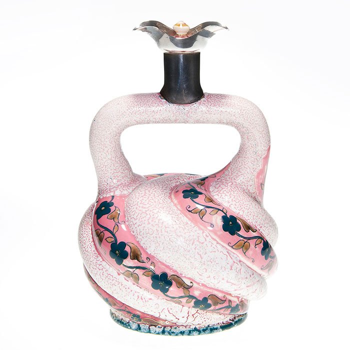 Zsolnay Pécs decanter with stopper, silver spout, 10”: Zsolnay Pécs handled decanter with pottery stopper fitting into a Hamilton & Inches dual pour silver spout. The melon swirl body is hand decorated with Delft blue flowers on pink alternating with fro