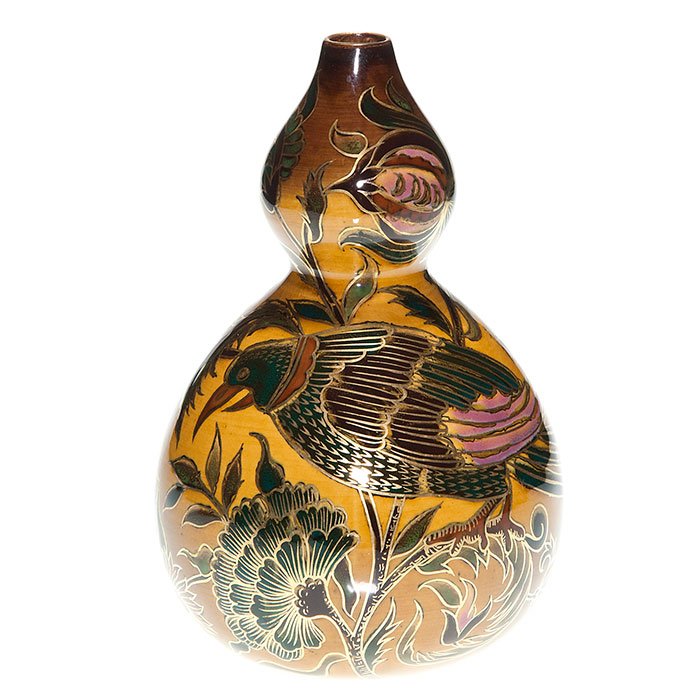 Early Zslonay vase, large bird and bugs, 7 3/4”: Early Zsolnay Pécs double gourd vase nicely decorated with a large bird and some insects among exotic flowers outlined by gold. Height 7 3/4 inches. Marked Zsolnay Pécs with the 5 churches logo. Nic