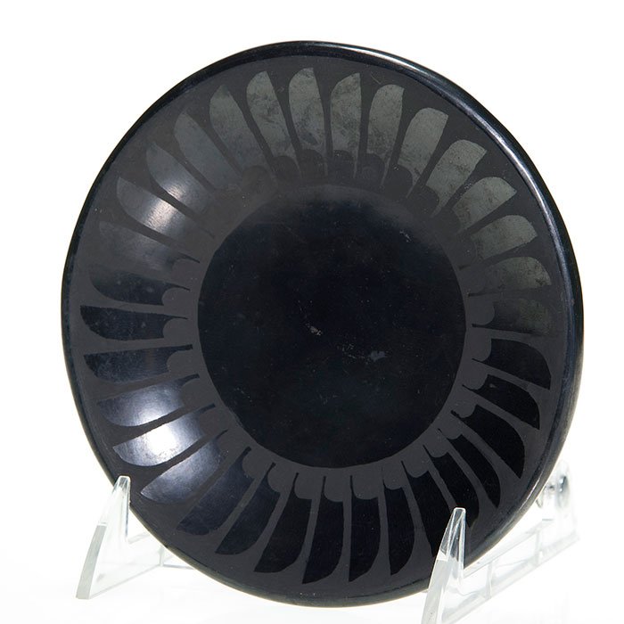 Maria and Santana small plate, feathers, 5 5/8 D: Maria and Santana Martinez (San Ildefonso Pueblo) plate with a band of feather decoration around the rim. Signed “Maria + Santana” on the bottom. Diameter is 5 5/8 inches. Minor rub or two otherwi