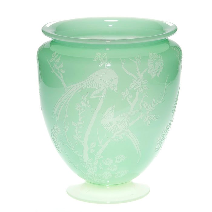 Steuben Green Jade vase, exotic birds, 938, 8 7/8”: Steuben green Jade and alabaster vase in shape 938 etched with agile pairs of exotic crested birds having lengthy flowing tails balancing among some flowering branches and repeated three times about t