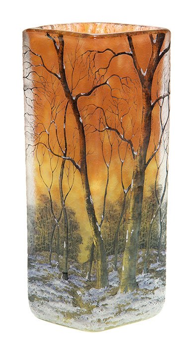 Daum Nancy cameo “Snow” vase, 7 1/4”, signed: Good Daum Nancy cameo vase revealing a panoramic view of a peaceful mature woodland after a falling of snow, the trees stark against a beautiful marmalade sky. Height 7 1/4 inches. Enamel signed “Da