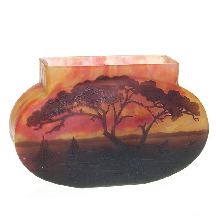 Daum Nancy scenic vase, boats, 4 3/8”, signed: Nice Daum cameo pillow vase depicting an after sunset evening overlooking a lake with sailing vessels and a weathered tree with it’s branches spanning, as if to say “Ta Da....I give you the lake��