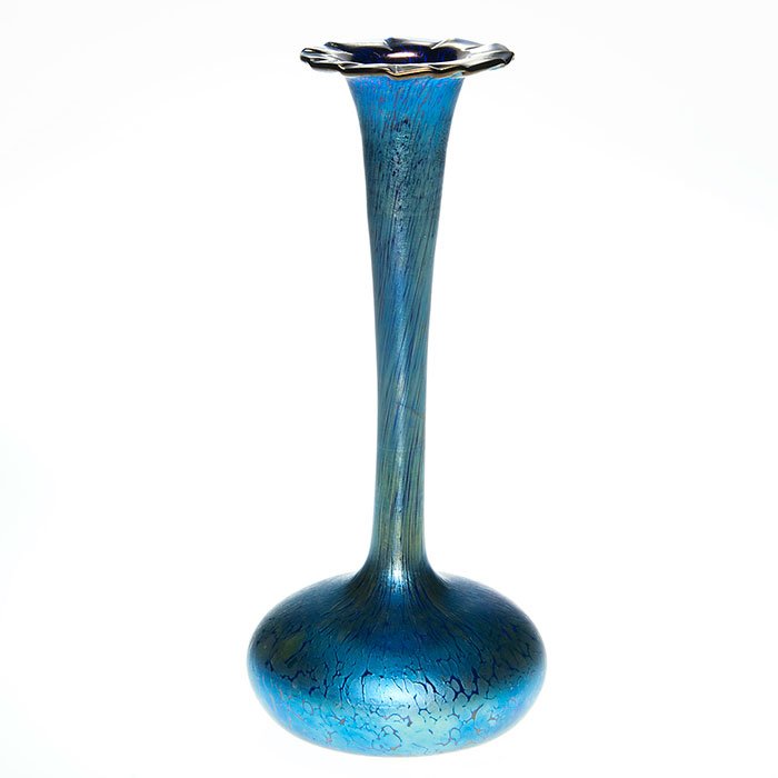 Loetz cobalt “Papillon” stick vase, 11 5/8”: Good Loetz “Papillon” flower form vase in cobalt blue with a long slender neck flaring into a nice fold back rim tooled at the edge creating a petal-like display. Height 11 5/8 inches. Handsome ve