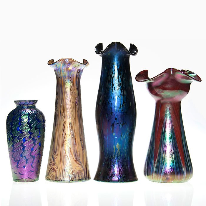 4 Austrian vases, all decorated, 6 1/2” to 11 1/4”: Four Austrian vases. Two being Rindskopf creations with ruffled rims with either a pull-up or King Tut swirl pattern. Heights are 9 inches and 10 inches respectively. The King Tut vase has an open fac