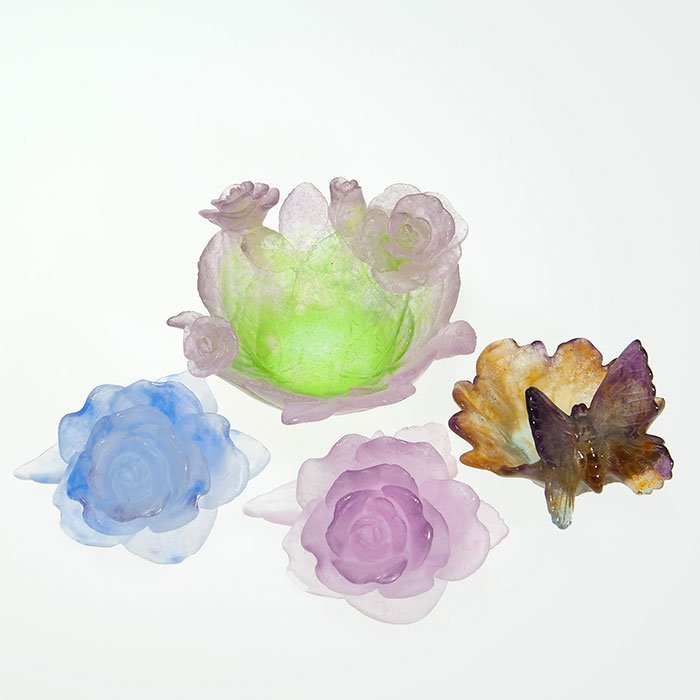 4 Modern Daum pate-de-verre: roses & butterfly: Four modern Daum Pate-de-Verre items. First a butterfly situated on a leaf measuring 2 1/2 inches by 3 1/4 inches. Second a miniature “roses” bowl measuring 2 1/4 by 4 7/8 inches. Third a twosome 