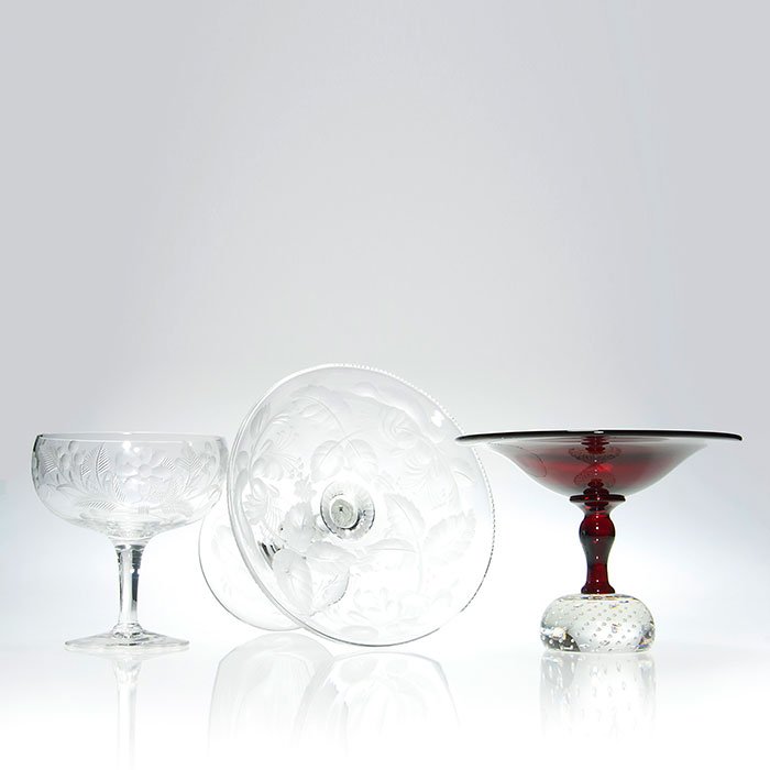 3 compotes: Libbey & 2 Pairpoint, engraved floral: Trio of compotes consisting a ruby Pairpoint on crystal half dome “bubbled” base, rising 5 inches and 6 3/4 inches across. Two crystal, marked Libbey having lovely floral patterns wheel cut on the