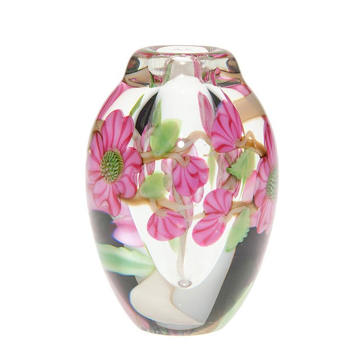 Mini Limited Edition Orient & Flume Greg Held vase: Miniature Orient & Flume vase a Limited Edition by Greg Held depositing a wreath of pink dogwood blossoms within clear glass. Height 2 5/8 inches. Signed with the artist and company names, limited num