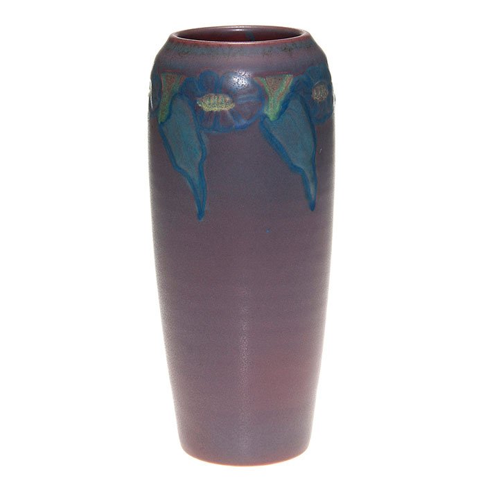 Rookwood mat vase, Todd, 1914, 951 D, 9”: Mat glaze 9 inch vase colorfully decorated with a repeating floral pattern carved at the shoulder by Charles Todd in 1914. Marks include the Rookwood logo, date, shape 951D and the artist’s incised 