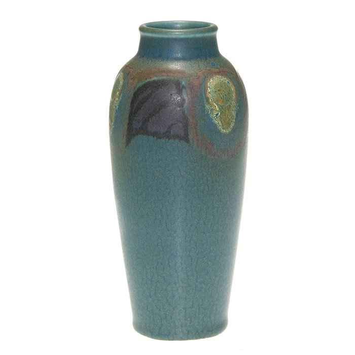 Rookwood mat vase, Todd, 1919, 918 E, 6 1/8”: Mat glaze 6 1/8 inch vase decorated by Charles Todd in 1919 with a floral band at the shoulder in purple, black, brown, yellow and green. Marks include the Rookwood logo, date, shape 918E, an impresse