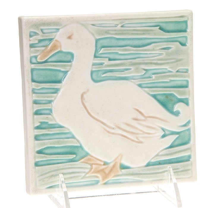 Rookwood “Duck” trivet, 1924, shape 3201, 5 5/8”: Rookwood polychromed “Duck” trivet made in 1924. Marks include the company logo, the date and shape number 3201. Size is 5 5/8 inches square. Uncrazed with a few faint pepper spots.