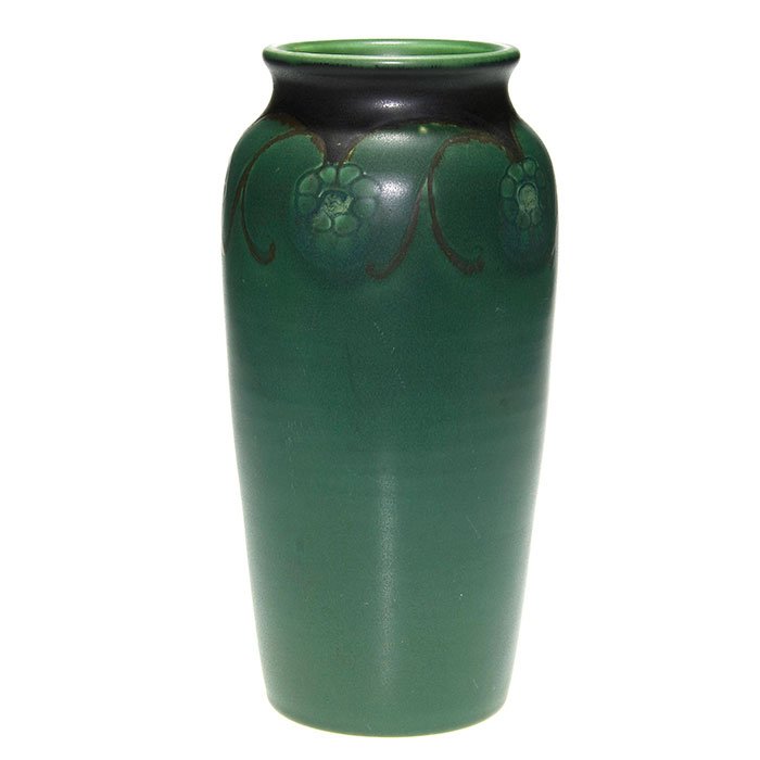 Rookwood mat vase, Todd, 1919, 1065 B, 11”: Mat Glaze 11 inch vase with a lightly incised and colored repeating floral decoration at the shoulder by Charles Todd in 1919. Marks include the Rookwood logo, date, shape 1065B, an impressed V and th