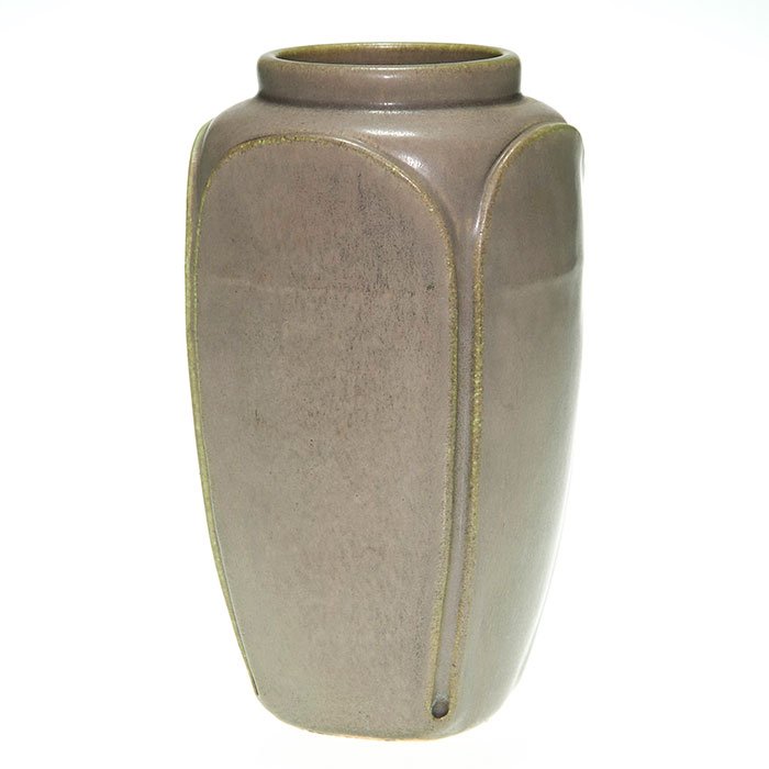 Hand tooled Rookwood mat vase, 1911, 1679, 7 1/4”: Hand tooled Rookwood mat glaze vase divided into four panels by raised lines. Marks include the company logo, the date and shape number 1679. Height 7 1/4 inches. Minor nicks to high points. Shape 167