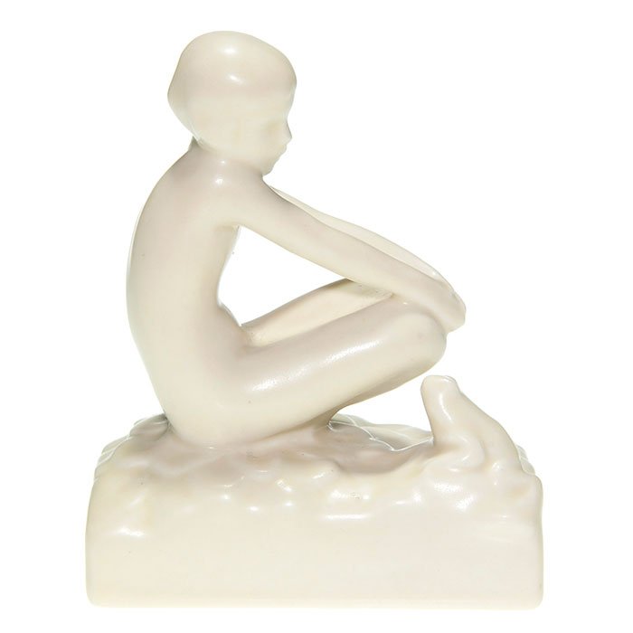 Rookwood girl and frog paperweight, 1935, 4 5/8”: Figure of a nude girl and a frog seated atop some aquatic vegetation, a Louise Abel design, cast in 1935 and covered with the Ivory Mat glaze. Marks include the Rookwood logo, date and shape 6521. In 