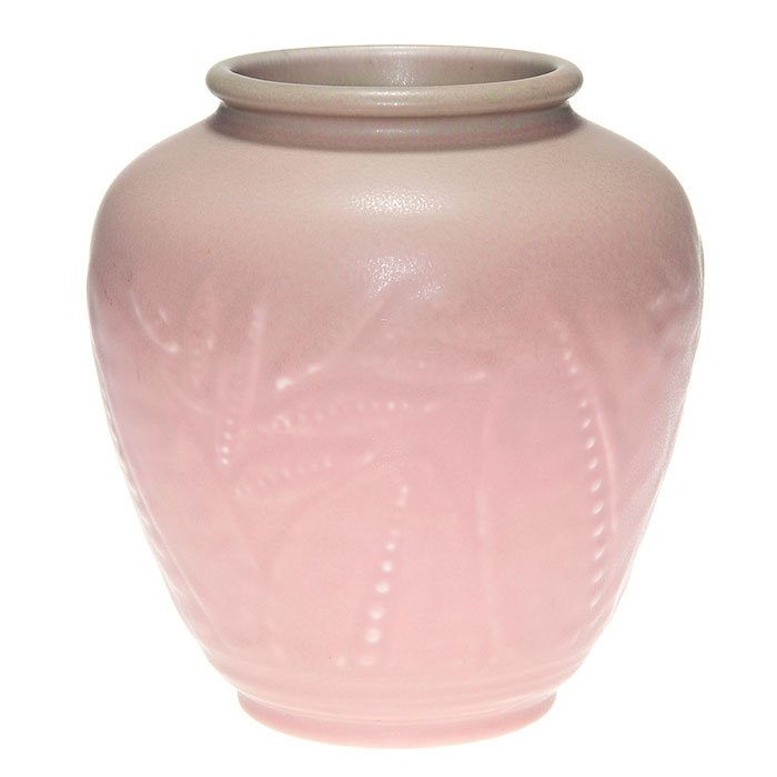Rookwood pink mat production vase, 1932, 6 1/4”: Rookwood pink mat production vase with embossed Art Deco flowers done in 1932. Marks include the company logo, the date and shape numb er 6218. Height 6 1/4 inches. Uncrazed.