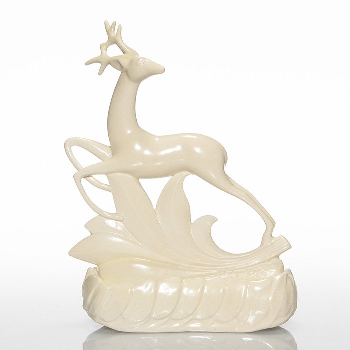 Cowan Saquinay Stag figure, special ivory, 10 7/8”: Cowan Pottery “Saquinay Stag” flower figure, attributed to Waylande Gregory and covered in the Special Ivory glaze. Impressed on the bottom with the circular Cowan logo. There have been profession
