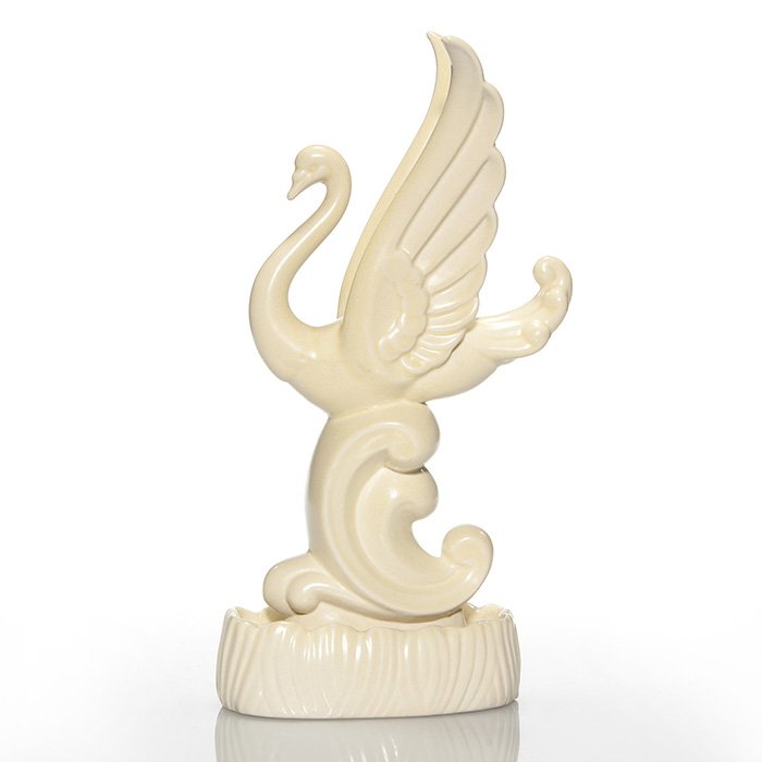 Cowan Swan flower frog, special ivory, 11 3/4”: Cowan Swan flower frog, a Waylande Gregory design, covered in the Special Ivory glaze. Marked on the bottom with the circular Cowan logo, Cowan impressed in block letters and the shape number F-7 in p