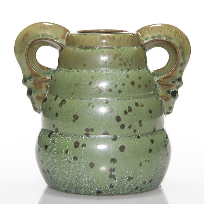 Fulper twin handled leopard skin vase, 6 1/4”: Fulper Pottery twin handled vase covered with the Leopard Skin crystalline glaze. Marked on the bottom with the Fulper “racetrack” ink stamp. Excellent original condition. Interesting glaze. heigh