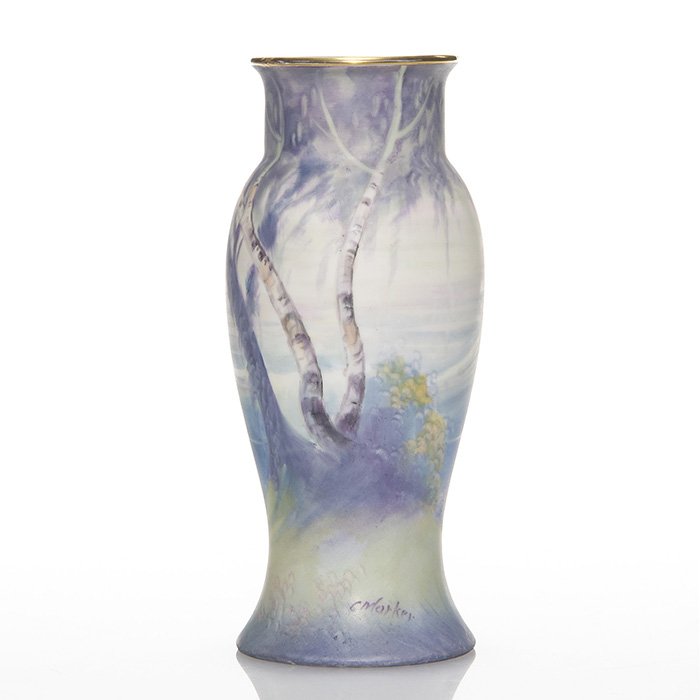 Pickard Scenic Vellum by Curtis Marker, ca 1919, 8”: Pickard Scenic Vellum vase with birch trees and snow covered mountain peak in the background painted by Curtis H. Marker on a Bavarian blank, circa 1919. The scene wraps around the vase and is complim