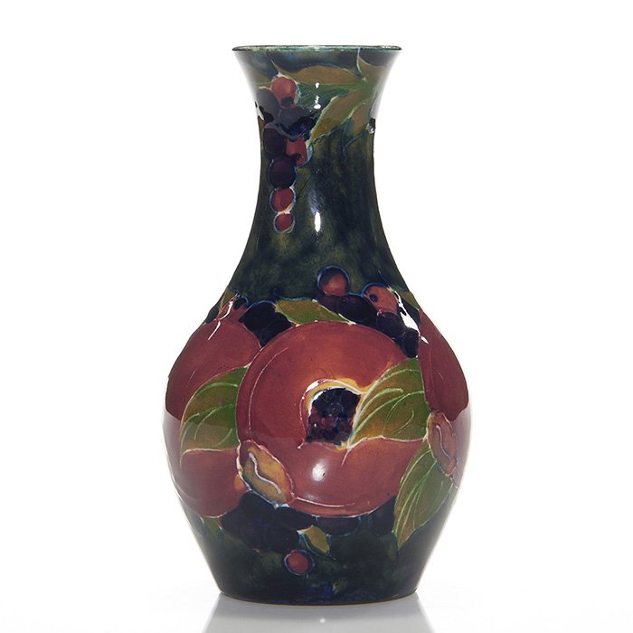 Moorcroft Burslem Pomegranate vase, 5 1/2”: Moorcroft Burslem Pomegranate vase. Height 5 1/2 inches. Marks include the impressed “Moorcroft Burslem England” and the William Moorcroft signature in green slip. Fine looking vase in excellent c