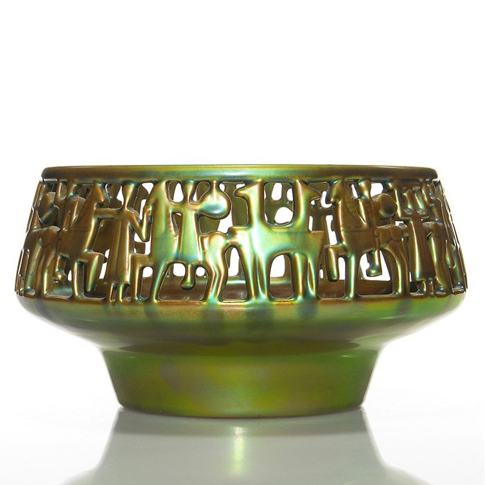 Zsolnay green Eosin bowl, figures horses, 4 1/4”: Zsolnay reticulated bowl with horses and riders, covered in the green Eosin glaze. Marked on the bottom with the Zsolnay 5 Churches ink stamp and “Made in Hungary”. Height is 4 1/4 inches and 8 1/