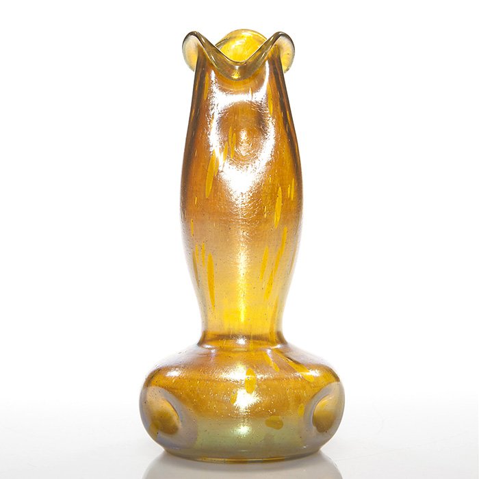 Loetz “Asträa” gourd vase, gold, ruffled, 10 1/2”: Loetz “Asträa” gourd vase, a silvery honey gold with a nice tri-pulled ruffled rim and having a trio of dimples on the neck and body. Height 10 1/2 inches. Spuriously signed LCT G2974 beneath. Go