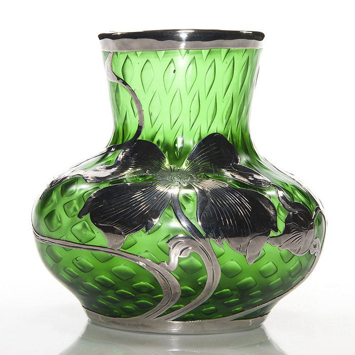 Loetz attributed silver overlay vase, 4 1/4”: Sterling silver overlay vase attributed to Loetz. The squatty green form having controlled air trapped diamond forms within. The sterling formed as dogwood flower heads with buds on serpentine branche