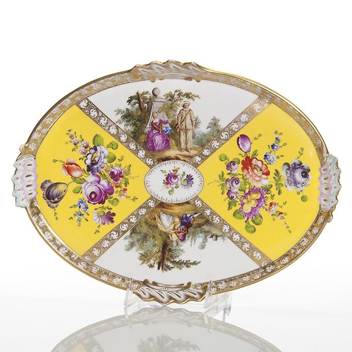 Meissen dresser tray, hand painted, 10 7/8 x 15”: Meissen porcelain dresser tray hand painted with floral bouquets over sunny yellow separated by outdoor scenes with family groups, bordered by gold patterns. Measures 10 7/8 inches by 15 inches. Impre
