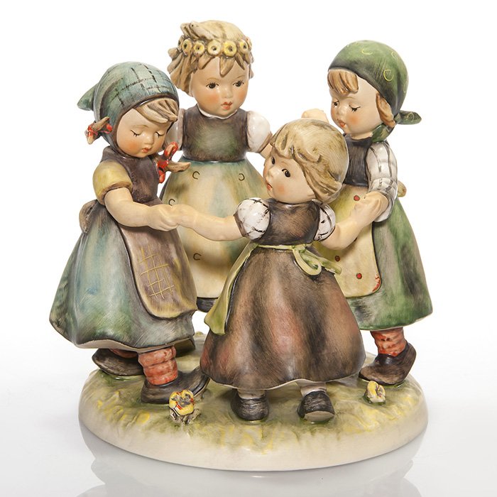 Hummel “Ring Around the Rosie” figural, 1957, 7”: Hummel “Ring Around the Rosie” figure modeled in 1957 by master sculptor Gerhard Skrobek but not released until 1960 for the 25th Anniversary of M.I. Hummel figurines. Height is 7 inches. Marked o