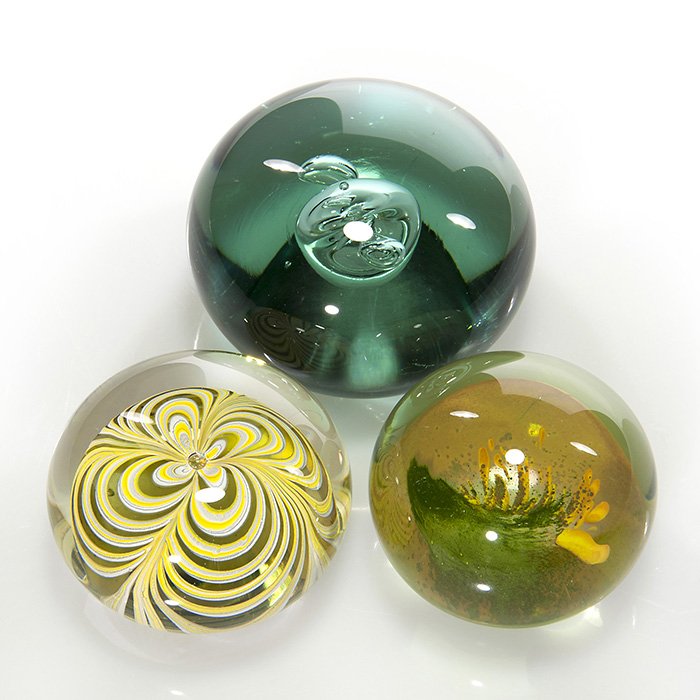 3 Labino paperweights: aqua Ariel, floral & moss: Three Dominick Labino signed paperweights. 1) A 2 inch Aqua Ariel, signed and dated 1971. 2)A 1 7/8 inch with moss & tender spring shoots, signed with 1971 date. 3) 1 5/8 inch yellow & white “loop��
