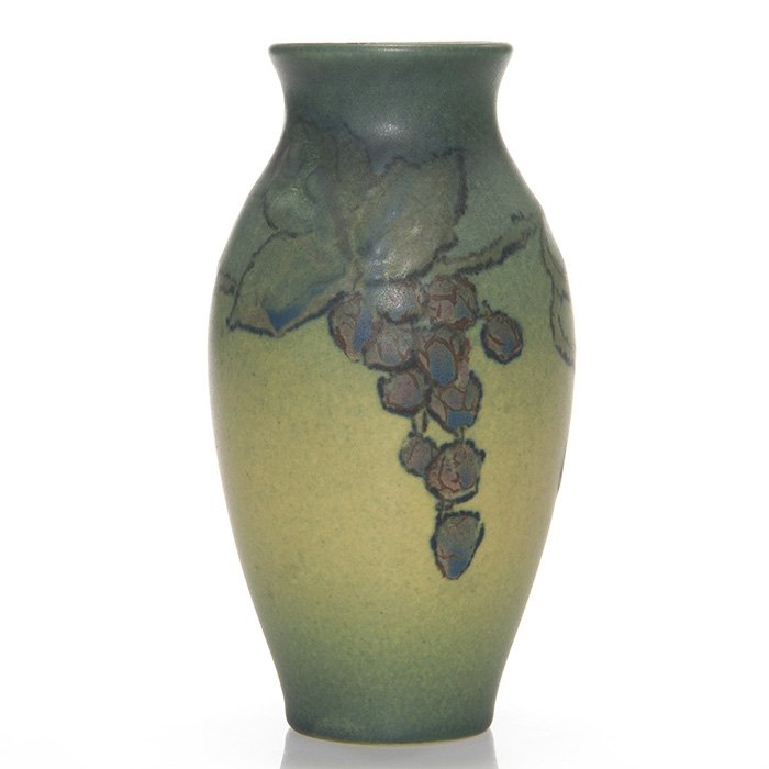 Rookwood mat floral vase, Tischler,1922,356E,6 3/4”: Mat glaze vase decorated with grapes and vines, the work of Vera Tischler in 1920. Marks include the Rookwood logo, date, shape 356E and the artist’s initials in black slip. There has been a profess