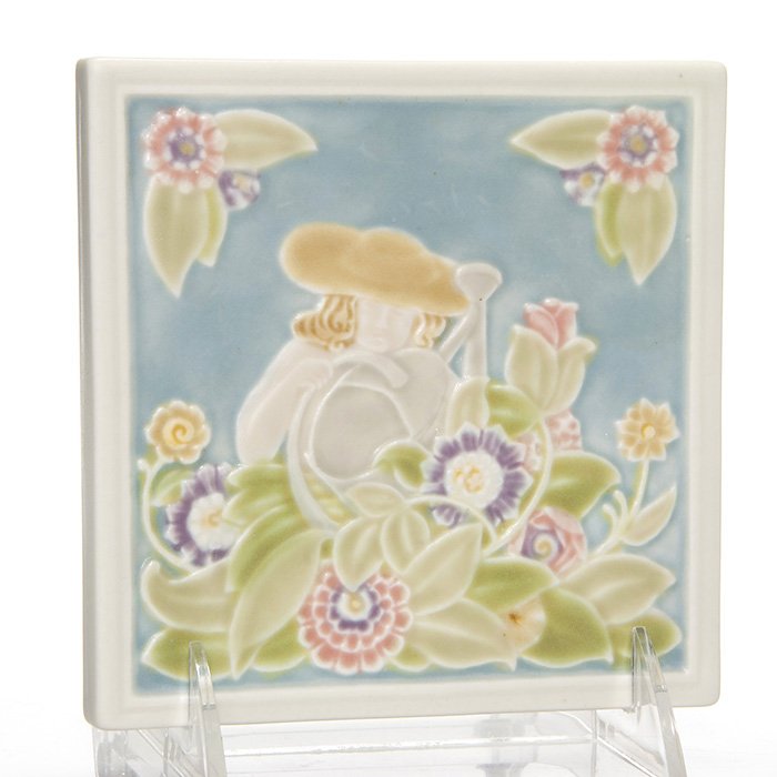 Rookwood trivet, “Girl Gardening”, 1940, 5 1/4” sq: Scarce 5 1/4 inch tea tile depicting a little blond girl in a big yellow hat seated in a blooming garden beneath a blue sky. Cast in 1940, the tile is impressed with the Rookwood logo, date and shape