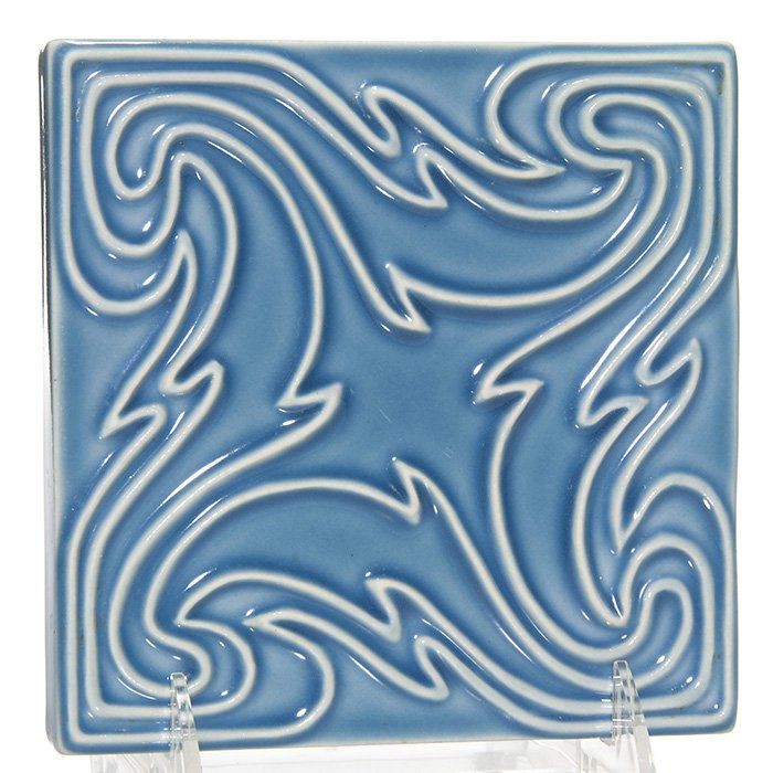 Rookwood trivet, blue porcelain, 1953, 5 3/4” square: Production 5 3/4 inch square trivet made at Rookwood in 1953 and covered with a deep blue high glaze. Marked with the Rookwood logo, date and shape number 1212. Uncrazed with the glaze being just a bi