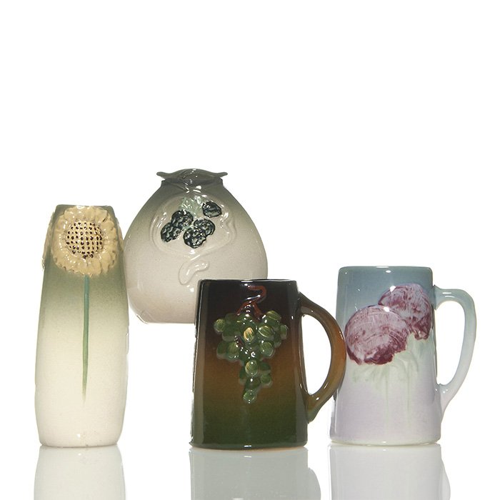 4 pieces Weller, 2 Etna, 2 Floretta: 4 Pieces of Weller Pottery. 1) Floretta three sided vase, a trio of yellow sunflowers surrounding the rim. Height 7 1/4 inches. Impressed “Weller Floretta, 59”. Tiny glaze nick at the base rim, ot