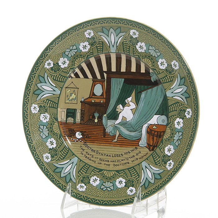 Buffalo Emerald Deldare plate “Dr. Syntax”, 9 1/4: Buffalo Emerald Deldare 9 1/4 inch plate depicting Dr. Syntax in his sleeping quarters inscribed “Doctor Syntax Loses His Wig, The rats it seems had play’d the rig in tearing up the doctors wig.��