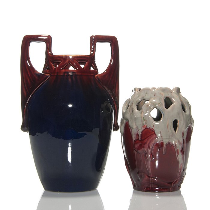 2 Michael Andersen reticulated vases, 7 1/2” & 11”: Two Michael Andersen reticulated vases, die impressed M.A.& S, Denmark. 1) 7 1/2 inch has leafing vine embossing and covered with a thick gray glaze flowing over crimson red, incised 1152. 2)11 inch a