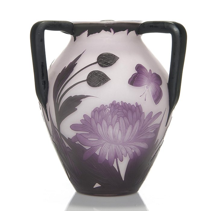 Loetz cameo vase, 3 handles, 6 1/4”, cameo signed: Good Loetz Art Deco cameo vase adorned with three angular black handles. Two butterflies, front and back, are attracted to a growth of “mums” flourishing above their foliage, done in raspberry pin
