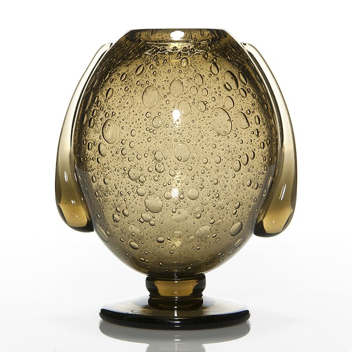 Schneider vase w/drip side ornaments, bubbles, 8”: Good Schneider golden brown vase with teardrop ornaments applied to the sides, the body effervescent with variously sized bubbles. Measures 8 inches by 7 inches across. Acid stamped “Schneider” in