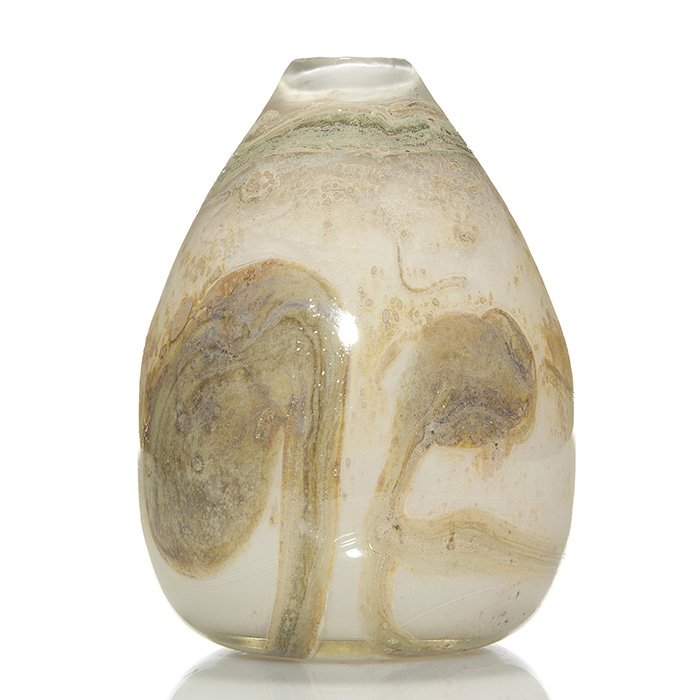 Samuel J. Herman vase, metallic designs, 8”, 1971: Early Samuel J. Herman ovoid vase with metallic fume designs in sand color surrounding the off white form. Height 8 inches. Engraved “Samuel J. Herman” with the 1971 creative date. Mr. Herman, was